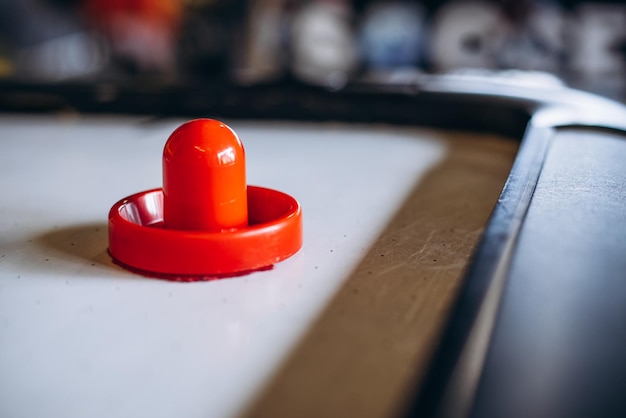 Red puck on the game table