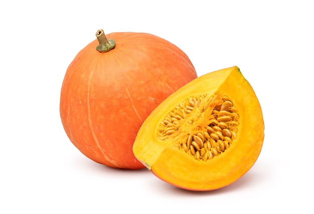 Red pumpkin with sliced isolated on white background. clipping path.