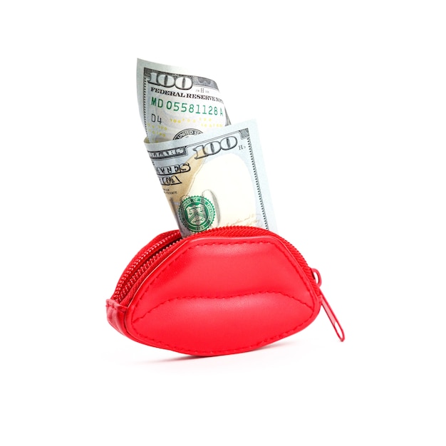Red purse in the form of lips and banknotes of one hundred dollars.