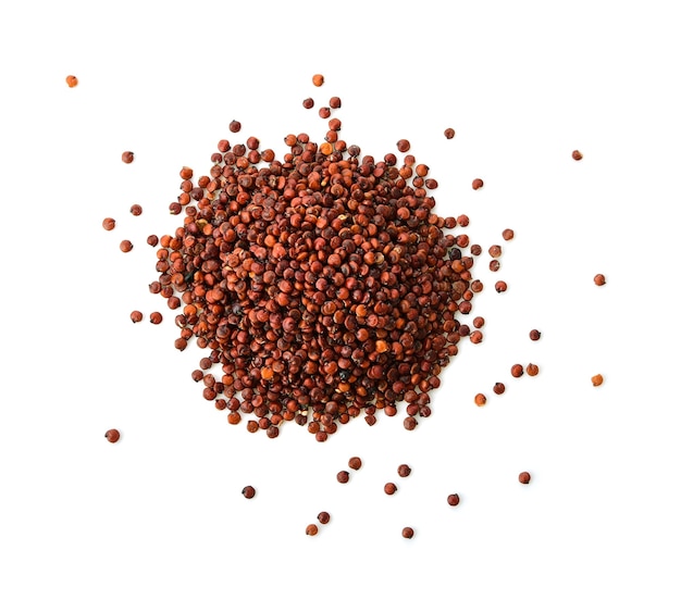 Red quinoa seeds isolated on white. Top view