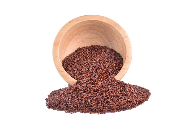 Red quinoa on white background