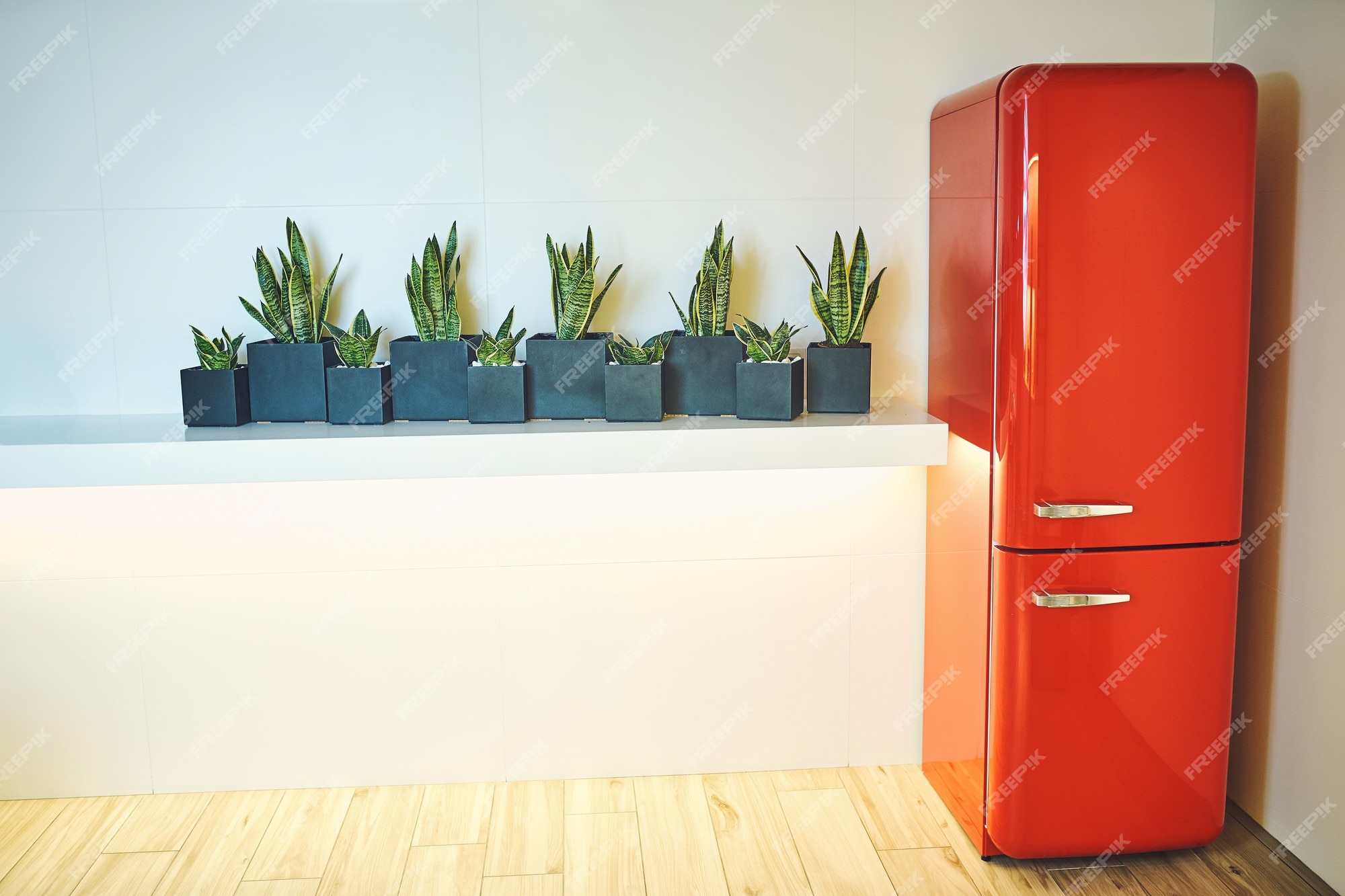 Premium Photo  Red refrigerator in the interior on a white background