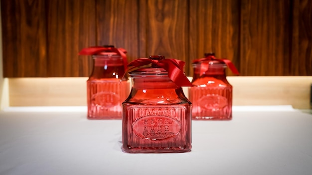 A Red Ribbon Adorned Jar The Perfect Decorative Piece