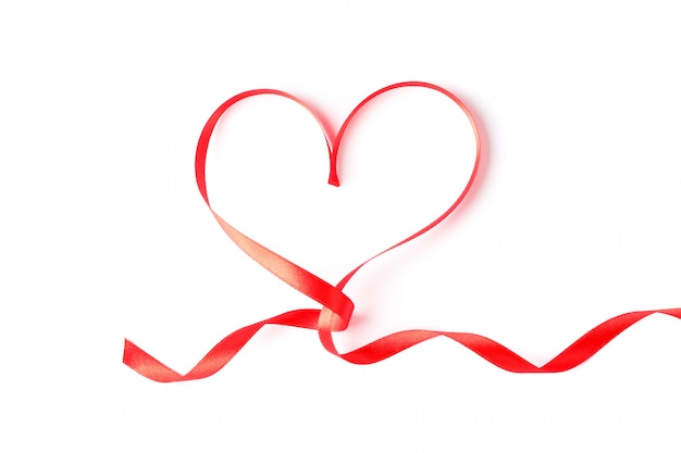 Photo red ribbon heart isolated on white