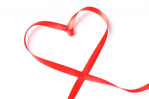 Red ribbon heart isolated on white