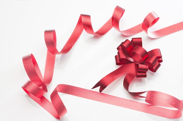 Red ribbon isolated on white background