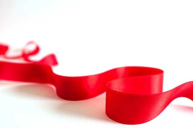 Red ribbon isolated on white background