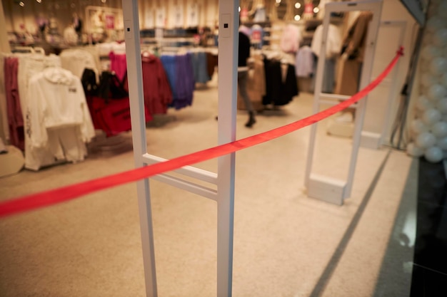 Red ribbon at the opening of the store closeup