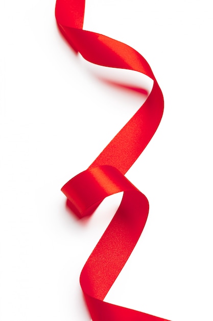 Red ribbon on white background