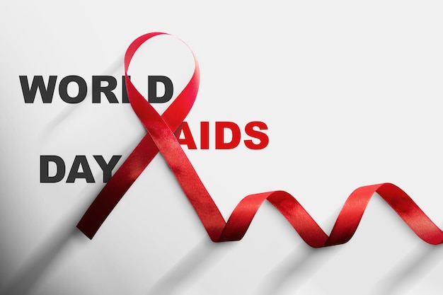 Red ribbon with white background. hiv aids ribbon\
awareness