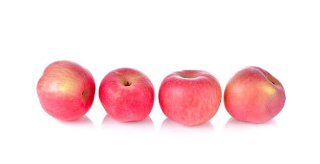 Red ripe apple on white wall