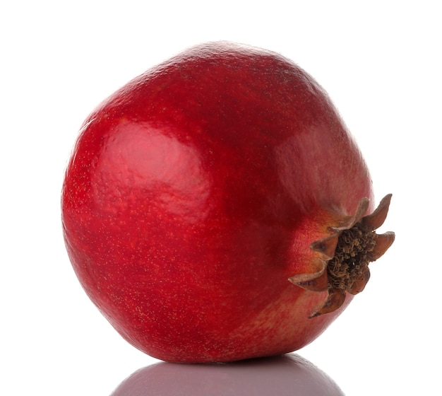 Red ripe pomegranate on a white background