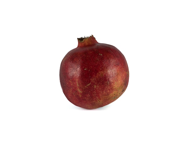 red ripe pomegranate on a white background