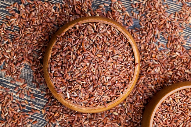 Red ripe rice, raw uncooked red rice, unpeeled to preserve the beneficial properties of cereals