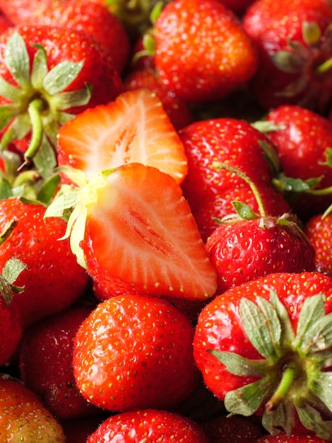 Red ripe strawberries background Close up top view