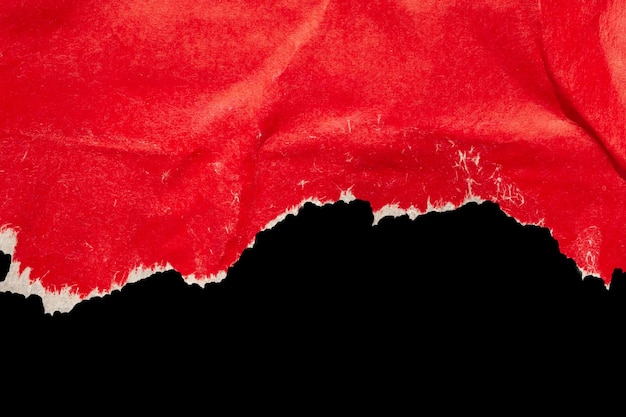 Photo red ripped paper torn edges strips isolated on black background