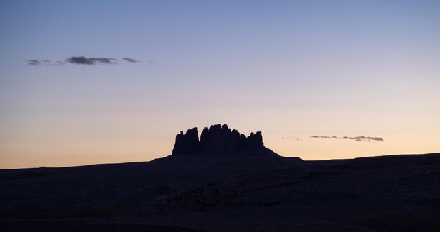 Red rock mountain landscape during colorful sunset sky