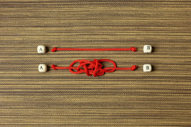 Red rope choice abstract image for business content