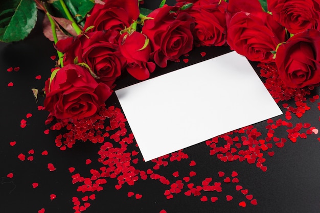 Red rose and blank gift card