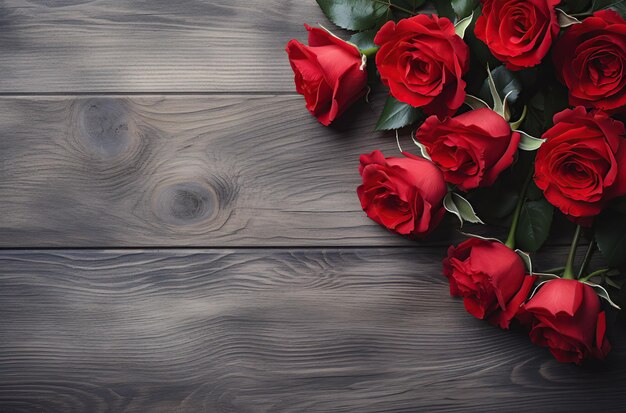 Red rose composition on wooden tabletop