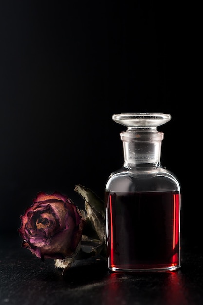 Red rose oil in the bottle