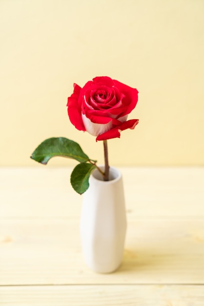 red rose on wood 