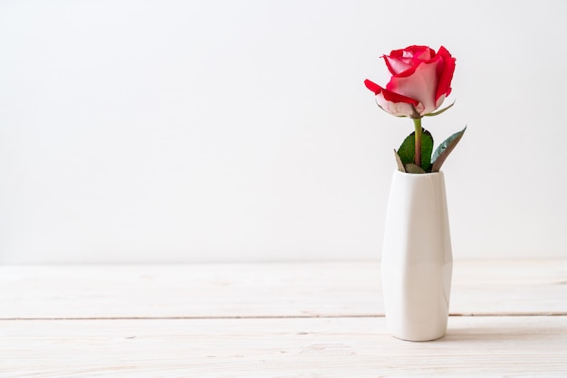 red rose on wood 