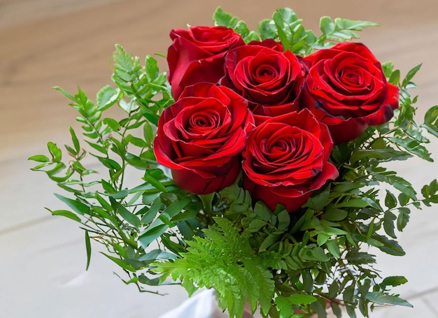 red roses with decorative hearts and presents