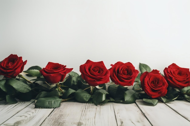 Red roses on a wooden table