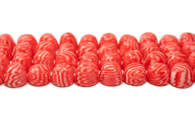 Red round tasty gummy candies islolated on a white background