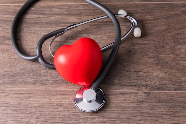 Red rubber heart and stethoscope