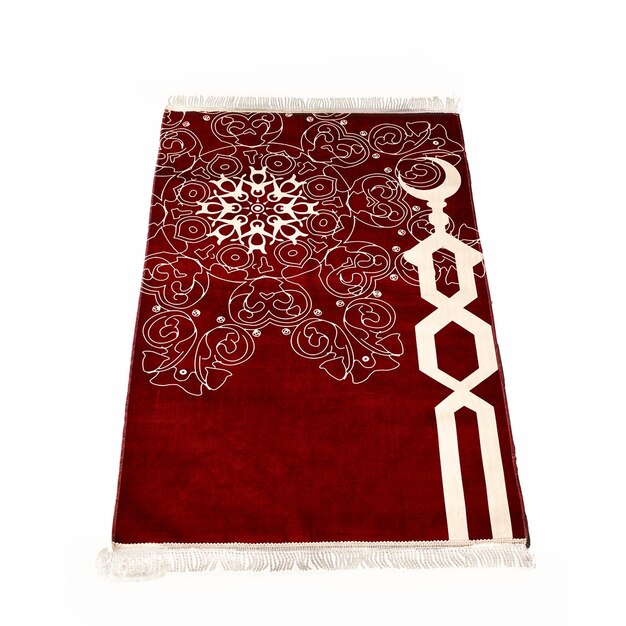 A red rug with a white design and a rose design on it