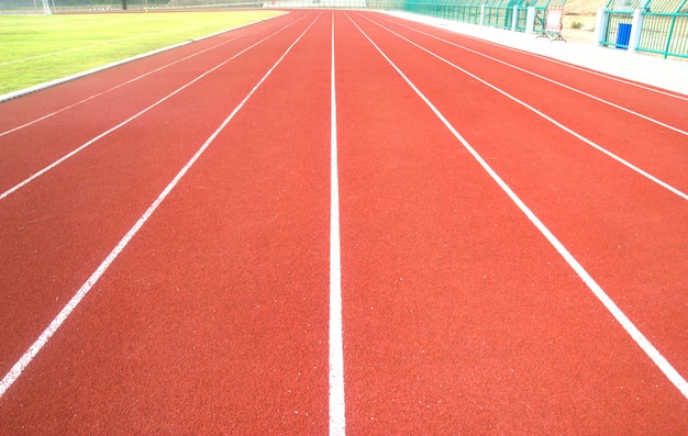 Red running track in stadium