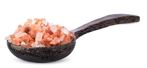 Red salt on wooden spoon isolated on white