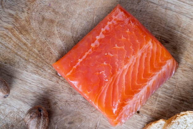 Red salted salmon fish meat on a chopping board