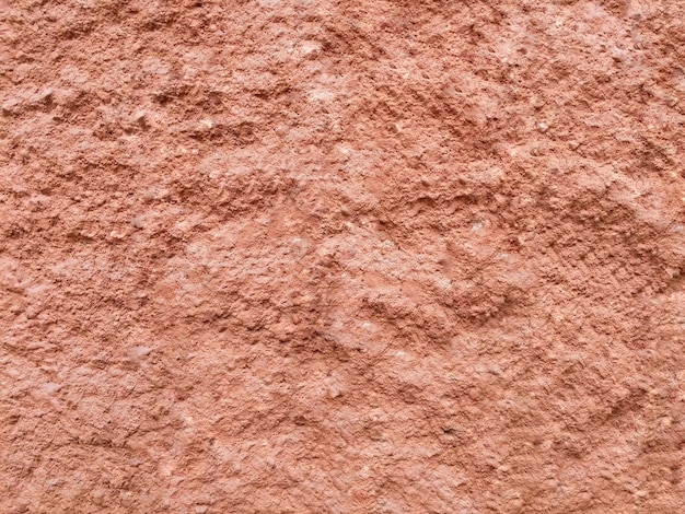 Red sandstone on wall texture and background