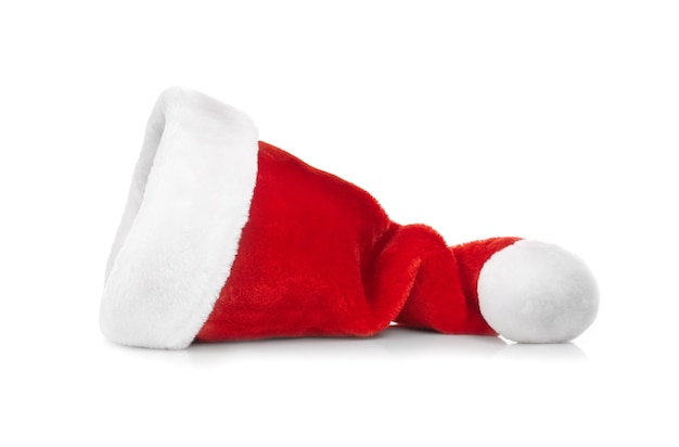 Red Santa Claus hat on white surface