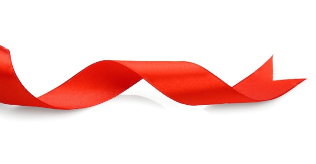 Red satin ribbon on white wall