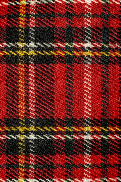 Red Scottish tartan texture background detail kilt traditional costume