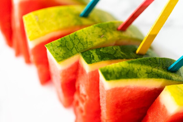 Red seedless watermelon slice popsicles for kids.