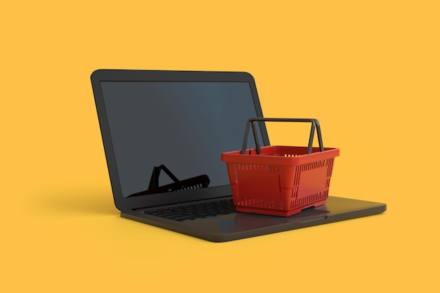 Red shopping basket over a laptop computer isolated on yellow background Online shopping concept 3D