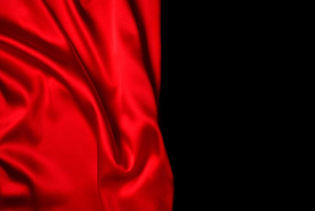 Photo red silk or satin luxury fabric texture can use as abstract background top view