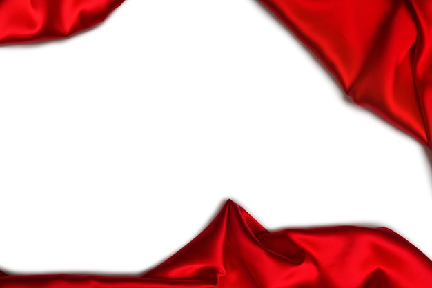Foto la trama del tessuto di lusso in seta rossa o satinata può essere utilizzata come sfondo astratto. vista dall'alto.
