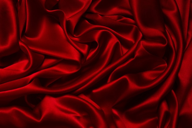 Premium Photo  Red silk or satin luxury fabric texture can use as