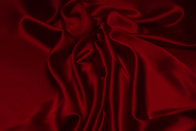 Red silk or satin luxury fabric texture