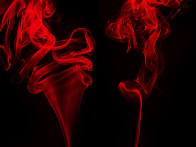 Red Smoke on black background darkness concept