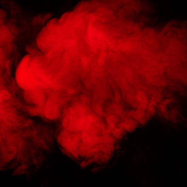 Premium Photo | Red smoke on black background