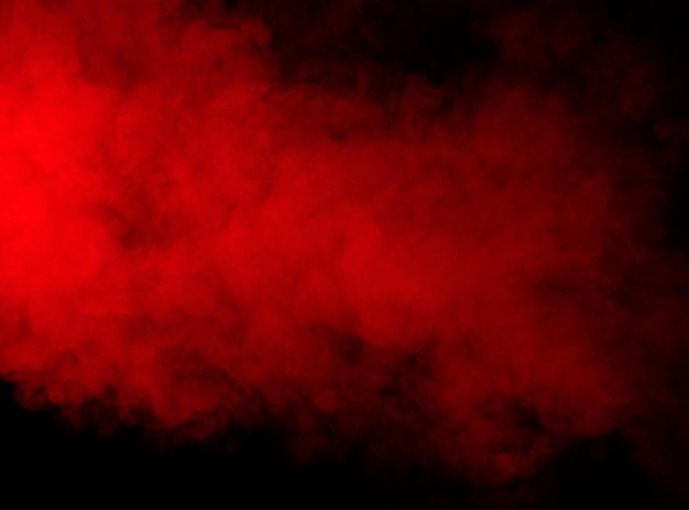 Red smoke on black background