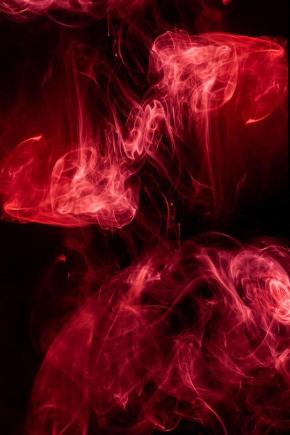 Red smoke motion on black background