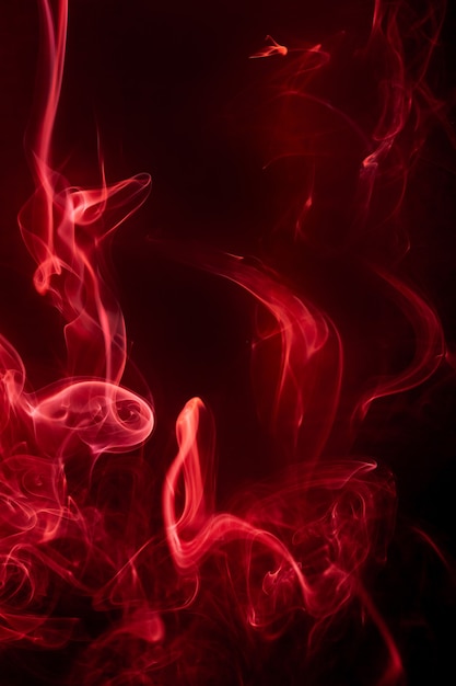 Red smoke motion on black background